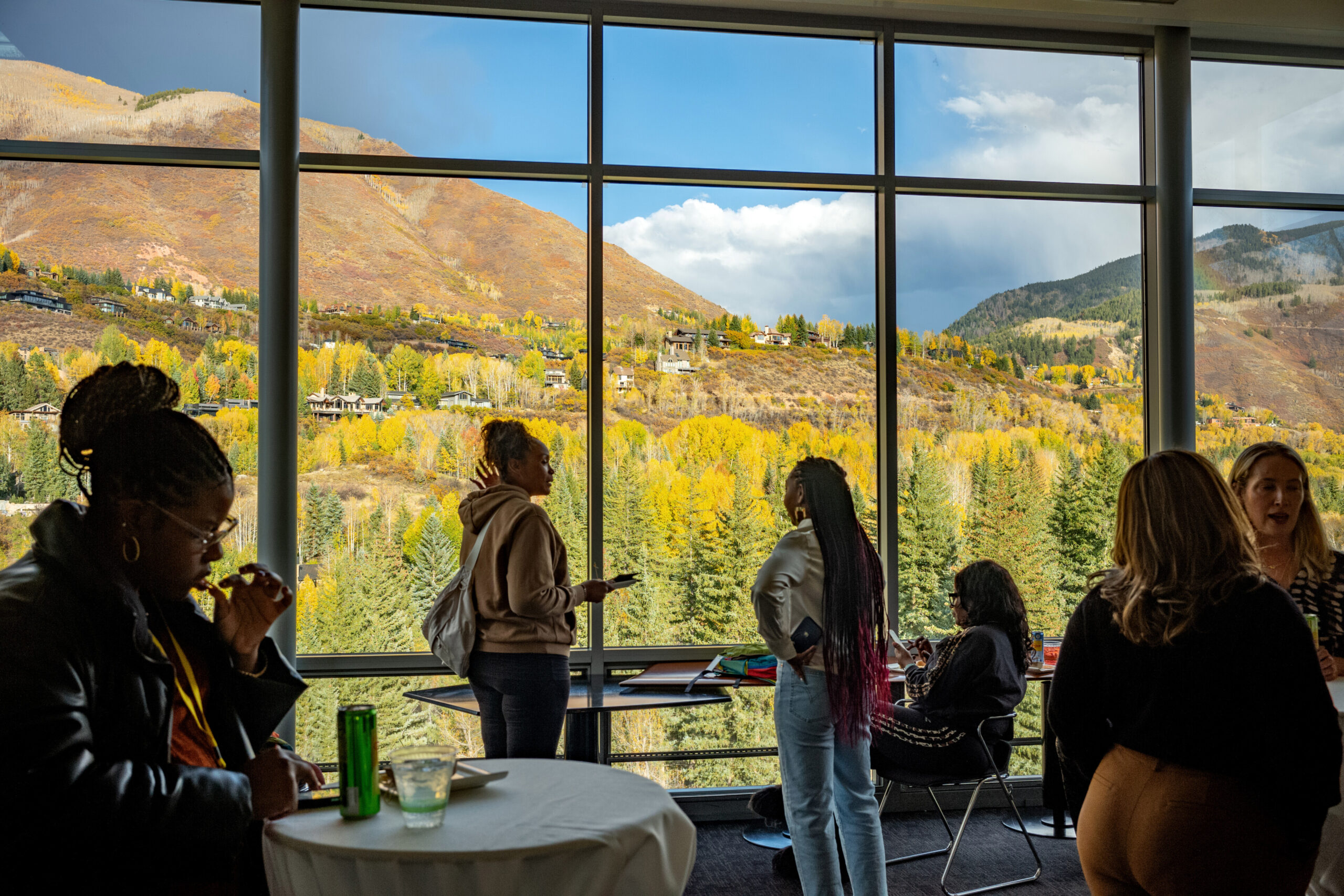 Image of a large window overlooking the Rocky Mountains.